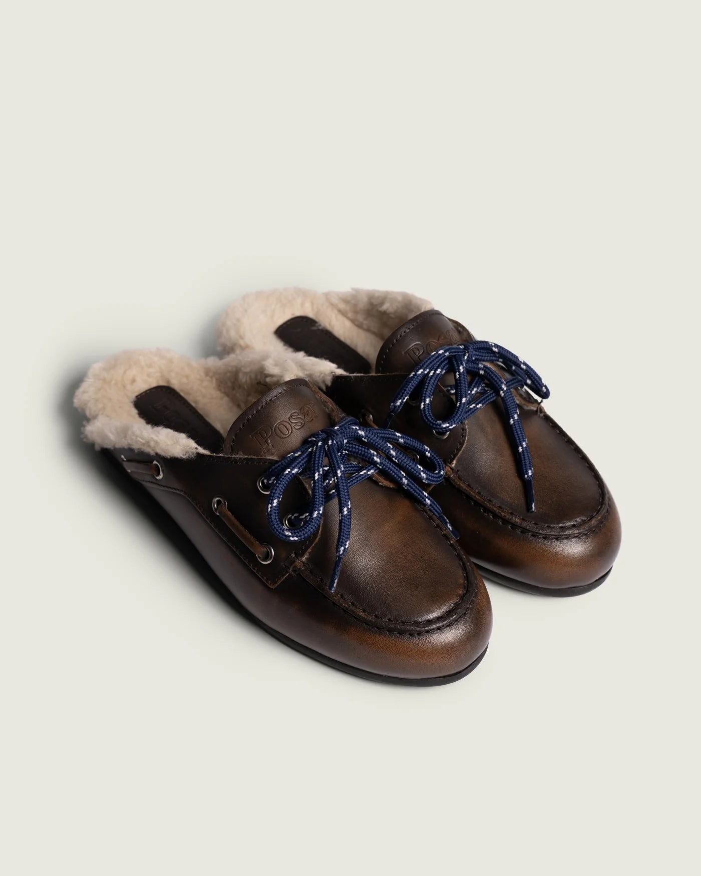 Mules en cuir fourées