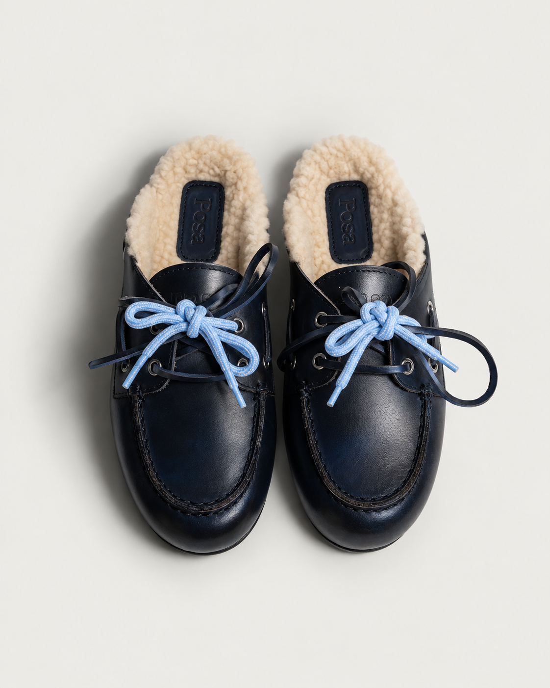 Black fur-lined leather mules